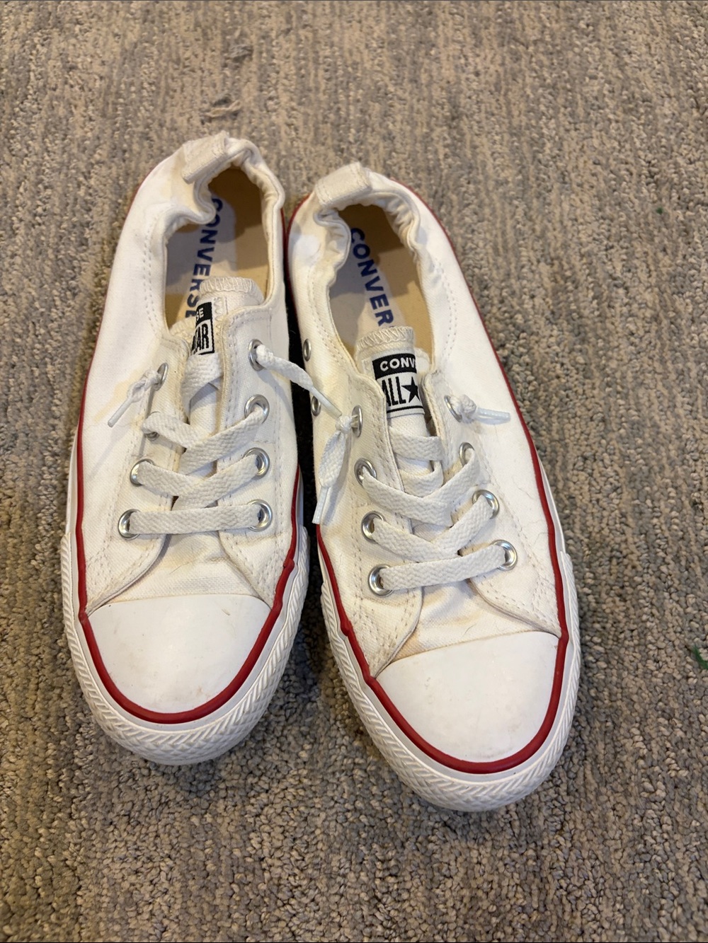 Converse women’s White Canvas Low-Top Sneakers with Red Trim